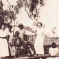 Mary and Elizabeth with women and children, Ivanhoe Station.